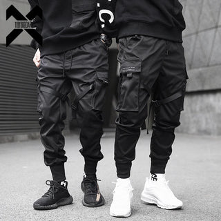Men Tactical Joggers Pants Multi-pocket Elastic Waist Harem Pants Men Hip Hop Streetwear Ribbons Design Functional Cargo Trouser